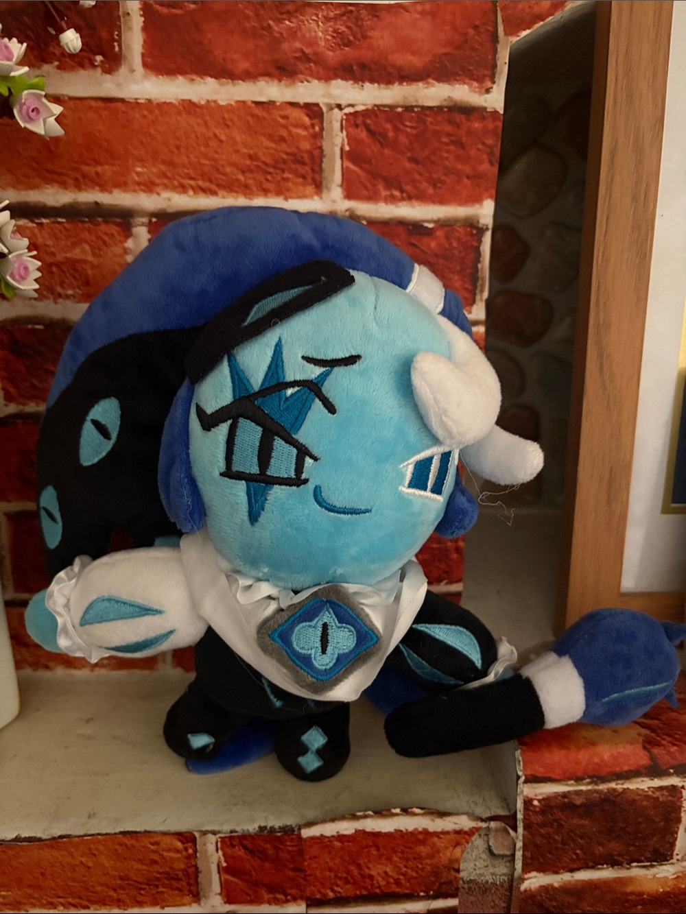 Blue Character Plush Toy with Black & White Details